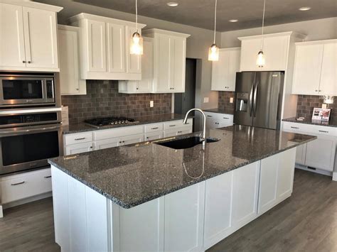 white kitchen cabinets steel grey granite countertops|contemporary kitchen whitewashed wood cabinets.